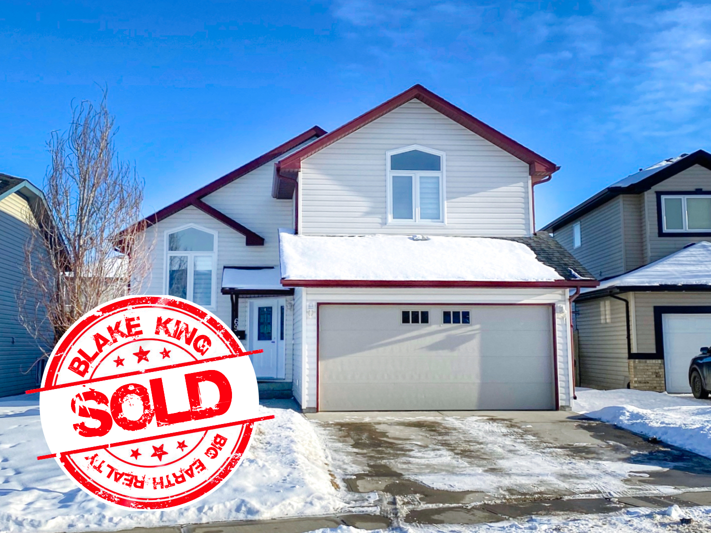 This 4 bedroom modified bilevel in Oriole Park SOLD! • RED DEER REAL